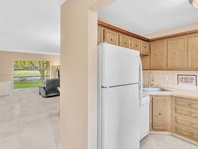 This 2 bedroom, 2 bath condo is perfectly situated on the first on Colony West Country Club in Florida - for sale on GolfHomes.com, golf home, golf lot