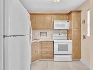 This 2 bedroom, 2 bath condo is perfectly situated on the first on Colony West Country Club in Florida - for sale on GolfHomes.com, golf home, golf lot