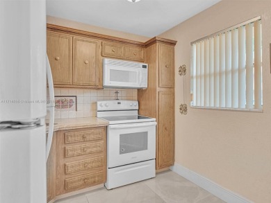 This 2 bedroom, 2 bath condo is perfectly situated on the first on Colony West Country Club in Florida - for sale on GolfHomes.com, golf home, golf lot
