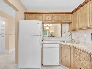 This 2 bedroom, 2 bath condo is perfectly situated on the first on Colony West Country Club in Florida - for sale on GolfHomes.com, golf home, golf lot