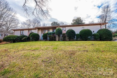 Nestled on the scenic Lake Hickory Country Club golf course on Lake Hickory Town Course in North Carolina - for sale on GolfHomes.com, golf home, golf lot