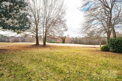 Nestled on the scenic Lake Hickory Country Club golf course on Lake Hickory Town Course in North Carolina - for sale on GolfHomes.com, golf home, golf lot