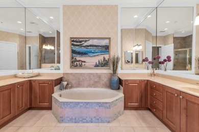 Step into this exquisite three-bedroom, three-and-a-half-bath on The Rookery At Marco in Florida - for sale on GolfHomes.com, golf home, golf lot