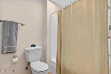 If you have been waiting for a townhome in The Woods section of on Sea Trail Golf Resort in North Carolina - for sale on GolfHomes.com, golf home, golf lot