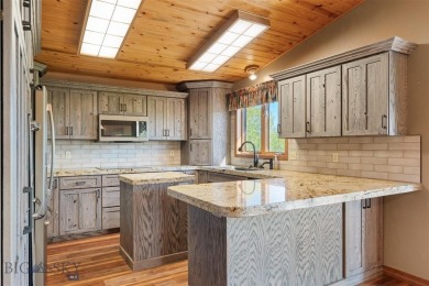 Stunning home on the 3rd green of the Three Forks Golf Course! on Headwaters Golf Course in Montana - for sale on GolfHomes.com, golf home, golf lot