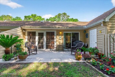 If you have been waiting for a townhome in The Woods section of on Sea Trail Golf Resort in North Carolina - for sale on GolfHomes.com, golf home, golf lot