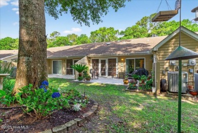 If you have been waiting for a townhome in The Woods section of on Sea Trail Golf Resort in North Carolina - for sale on GolfHomes.com, golf home, golf lot