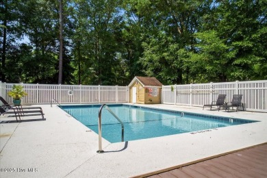 If you have been waiting for a townhome in The Woods section of on Sea Trail Golf Resort in North Carolina - for sale on GolfHomes.com, golf home, golf lot