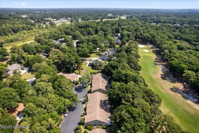 If you have been waiting for a townhome in The Woods section of on Sea Trail Golf Resort in North Carolina - for sale on GolfHomes.com, golf home, golf lot