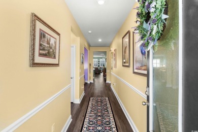 This thoughtfully designed home in The Retreat at Wild Wing on Wild Wing Plantation in South Carolina - for sale on GolfHomes.com, golf home, golf lot