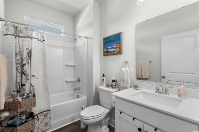This thoughtfully designed home in The Retreat at Wild Wing on Wild Wing Plantation in South Carolina - for sale on GolfHomes.com, golf home, golf lot