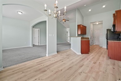 Welcome to this beautifully updated 4-bedroom, 3-bathroom home on Burning Ridge Golf Course in South Carolina - for sale on GolfHomes.com, golf home, golf lot