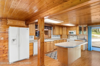 Your dream cabin in the woods awaits you.  Built by the original on Star Valley RV Golf Course in Wyoming - for sale on GolfHomes.com, golf home, golf lot