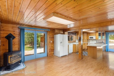 Your dream cabin in the woods awaits you.  Built by the original on Star Valley RV Golf Course in Wyoming - for sale on GolfHomes.com, golf home, golf lot