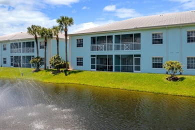 Welcome to this beautifully maintained 2-bedroom, 2-bathroom on Sabal Trace Golf and Country Club in Florida - for sale on GolfHomes.com, golf home, golf lot