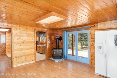 Your dream cabin in the woods awaits you.  Built by the original on Star Valley RV Golf Course in Wyoming - for sale on GolfHomes.com, golf home, golf lot