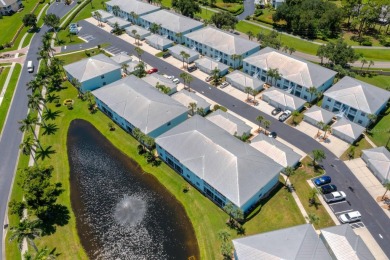 Welcome to this beautifully maintained 2-bedroom, 2-bathroom on Sabal Trace Golf and Country Club in Florida - for sale on GolfHomes.com, golf home, golf lot