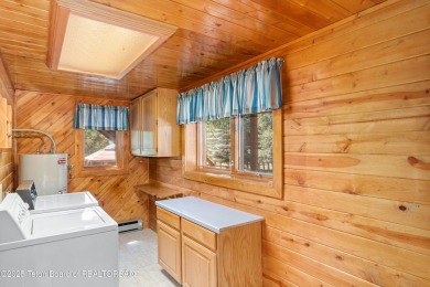 Your dream cabin in the woods awaits you.  Built by the original on Star Valley RV Golf Course in Wyoming - for sale on GolfHomes.com, golf home, golf lot