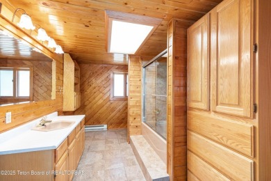 Your dream cabin in the woods awaits you.  Built by the original on Star Valley RV Golf Course in Wyoming - for sale on GolfHomes.com, golf home, golf lot