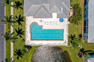 Welcome to this beautifully maintained 2-bedroom, 2-bathroom on Sabal Trace Golf and Country Club in Florida - for sale on GolfHomes.com, golf home, golf lot