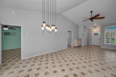 IN TIMBER GREENS A 55+ GATED GOLF COMMUNITY.....This 2-bedroom on Timber Greens Country Club in Florida - for sale on GolfHomes.com, golf home, golf lot