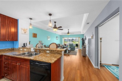 Welcome to this beautifully maintained 2-bedroom, 2-bathroom on Sabal Trace Golf and Country Club in Florida - for sale on GolfHomes.com, golf home, golf lot
