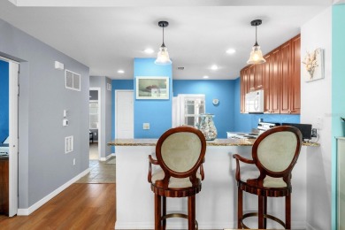 Welcome to this beautifully maintained 2-bedroom, 2-bathroom on Sabal Trace Golf and Country Club in Florida - for sale on GolfHomes.com, golf home, golf lot