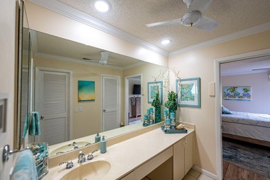 Discover this two-bedroom, two-bath end unit in Quail Meadows at on Martin Downs Country Club in Florida - for sale on GolfHomes.com, golf home, golf lot