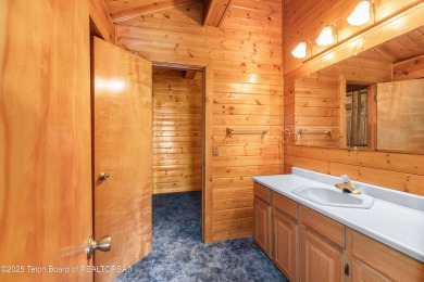 Your dream cabin in the woods awaits you.  Built by the original on Star Valley RV Golf Course in Wyoming - for sale on GolfHomes.com, golf home, golf lot