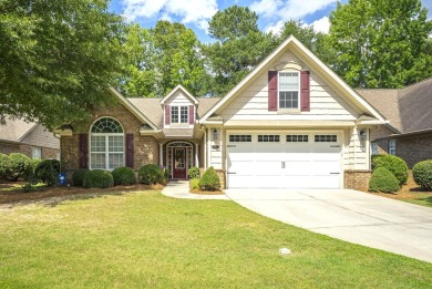 Soaring high ceilings, the inviting openness and hardwood floors on Woodside Plantation Country Club in South Carolina - for sale on GolfHomes.com, golf home, golf lot