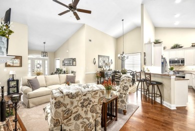 Soaring high ceilings, the inviting openness and hardwood floors on Woodside Plantation Country Club in South Carolina - for sale on GolfHomes.com, golf home, golf lot