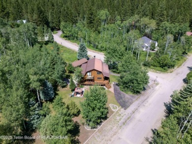 Your dream cabin in the woods awaits you.  Built by the original on Star Valley RV Golf Course in Wyoming - for sale on GolfHomes.com, golf home, golf lot
