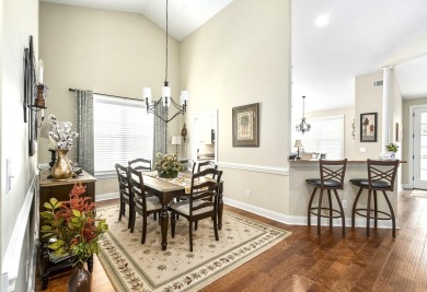 Soaring high ceilings, the inviting openness and hardwood floors on Woodside Plantation Country Club in South Carolina - for sale on GolfHomes.com, golf home, golf lot