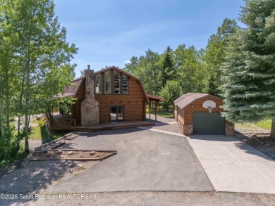 Your dream cabin in the woods awaits you.  Built by the original on Star Valley RV Golf Course in Wyoming - for sale on GolfHomes.com, golf home, golf lot