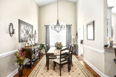 Soaring high ceilings, the inviting openness and hardwood floors on Woodside Plantation Country Club in South Carolina - for sale on GolfHomes.com, golf home, golf lot