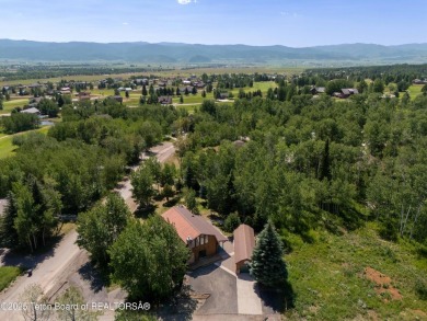 Your dream cabin in the woods awaits you.  Built by the original on Star Valley RV Golf Course in Wyoming - for sale on GolfHomes.com, golf home, golf lot