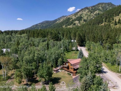 Your dream cabin in the woods awaits you.  Built by the original on Star Valley RV Golf Course in Wyoming - for sale on GolfHomes.com, golf home, golf lot