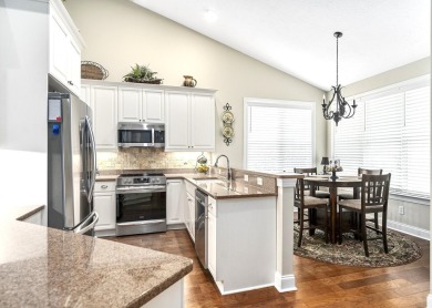 Soaring high ceilings, the inviting openness and hardwood floors on Woodside Plantation Country Club in South Carolina - for sale on GolfHomes.com, golf home, golf lot