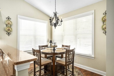Soaring high ceilings, the inviting openness and hardwood floors on Woodside Plantation Country Club in South Carolina - for sale on GolfHomes.com, golf home, golf lot