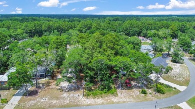 Let your imagination run wild on this incredible property on Oyster Bay Golf Links in North Carolina - for sale on GolfHomes.com, golf home, golf lot