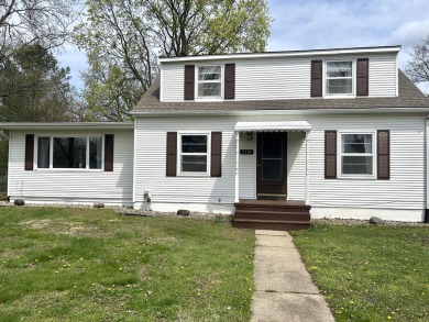 Very nice home with a HUGE living room addition with gas on Cascades Golf Course in Michigan - for sale on GolfHomes.com, golf home, golf lot