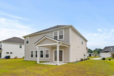 Welcome to this beautifully designed 5-bedroom, 3-bathroom home on The Members Club At Grande Dunes in South Carolina - for sale on GolfHomes.com, golf home, golf lot