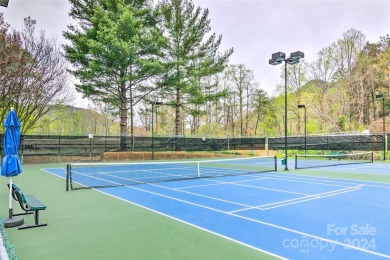 Welcome to this charming studio condo located in the Apple on Rumbling Bald Resort on Lake Lure in North Carolina - for sale on GolfHomes.com, golf home, golf lot