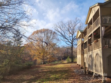 Welcome to this charming studio condo located in the Apple on Rumbling Bald Resort on Lake Lure in North Carolina - for sale on GolfHomes.com, golf home, golf lot