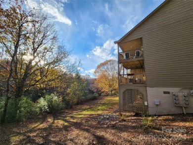 Welcome to this charming studio condo located in the Apple on Rumbling Bald Resort on Lake Lure in North Carolina - for sale on GolfHomes.com, golf home, golf lot