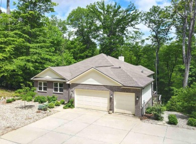 Experience refined lakefront living in this meticulously crafted on Foxcliff Golf Club in Indiana - for sale on GolfHomes.com, golf home, golf lot