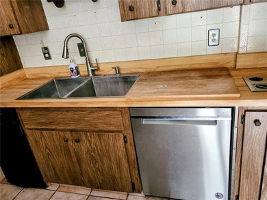 One or more photo(s) has been virtually staged. This charming on Jacaranda West Country Club in Florida - for sale on GolfHomes.com, golf home, golf lot