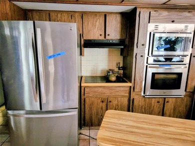 One or more photo(s) has been virtually staged. This charming on Jacaranda West Country Club in Florida - for sale on GolfHomes.com, golf home, golf lot