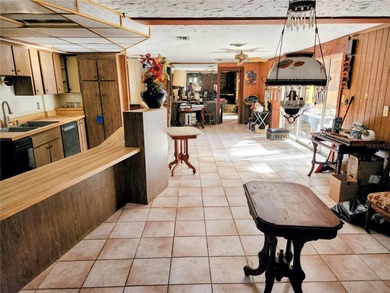 One or more photo(s) has been virtually staged. This charming on Jacaranda West Country Club in Florida - for sale on GolfHomes.com, golf home, golf lot