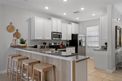 One-of-a-kind...OUTSTANDING Investment Property! This impeccable on The Oasis Club at Champions Gate in Florida - for sale on GolfHomes.com, golf home, golf lot
